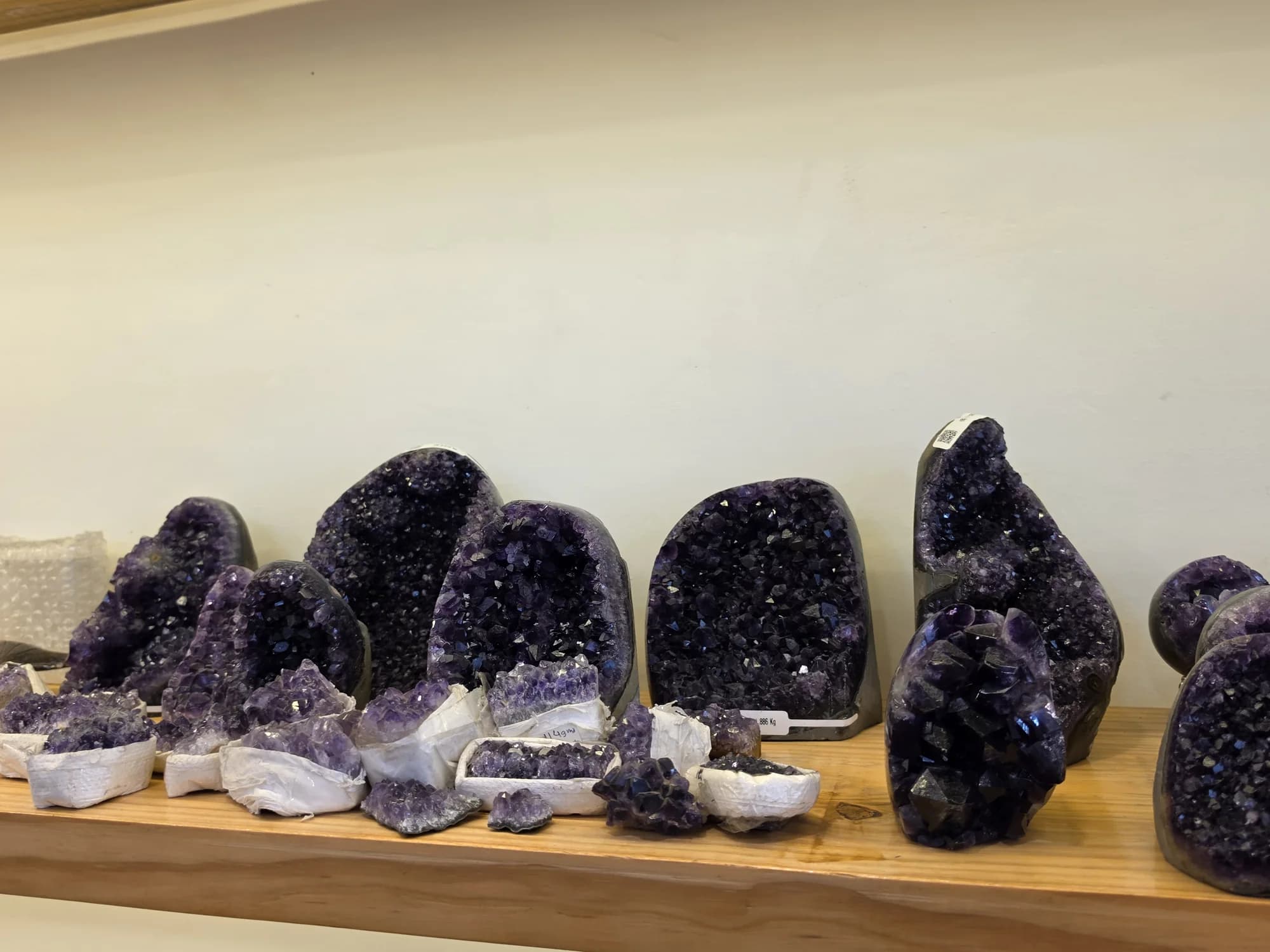 Amethyst clusters on the studio shelf